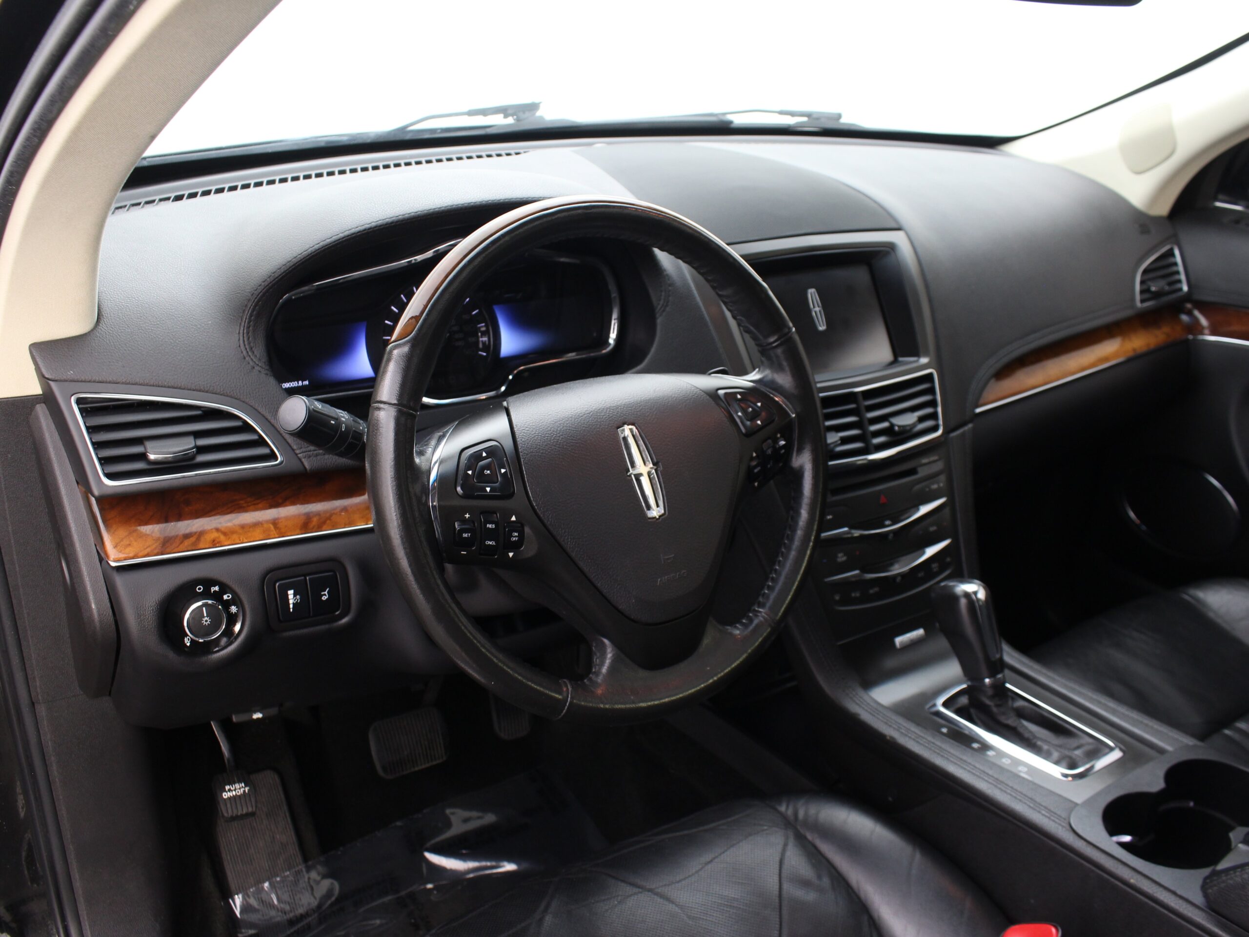 Town car driver cockpit with wood trim