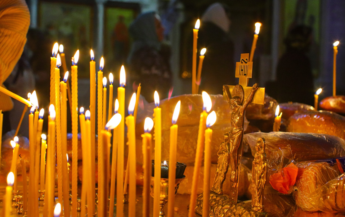 Candles lit in remembrance at a memorial service